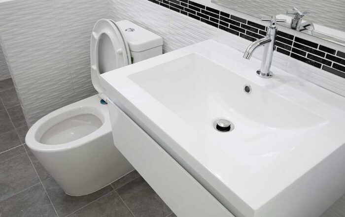 why does my sink gurgle when i flush the toilet